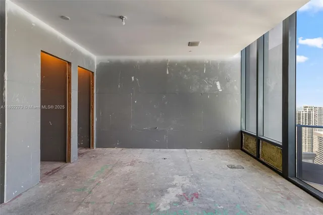 a bathroom with a shower and a tub