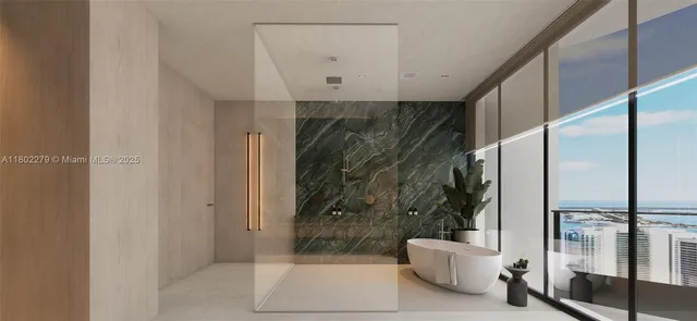 a view of an empty room with glass door