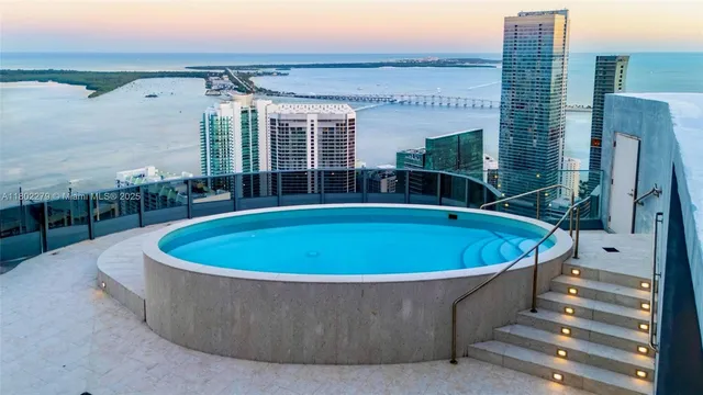 a view of potted plants in front of building