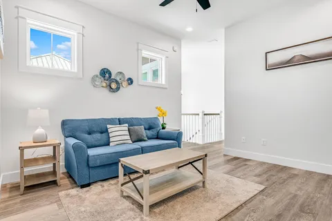 a living room with furniture and a couch