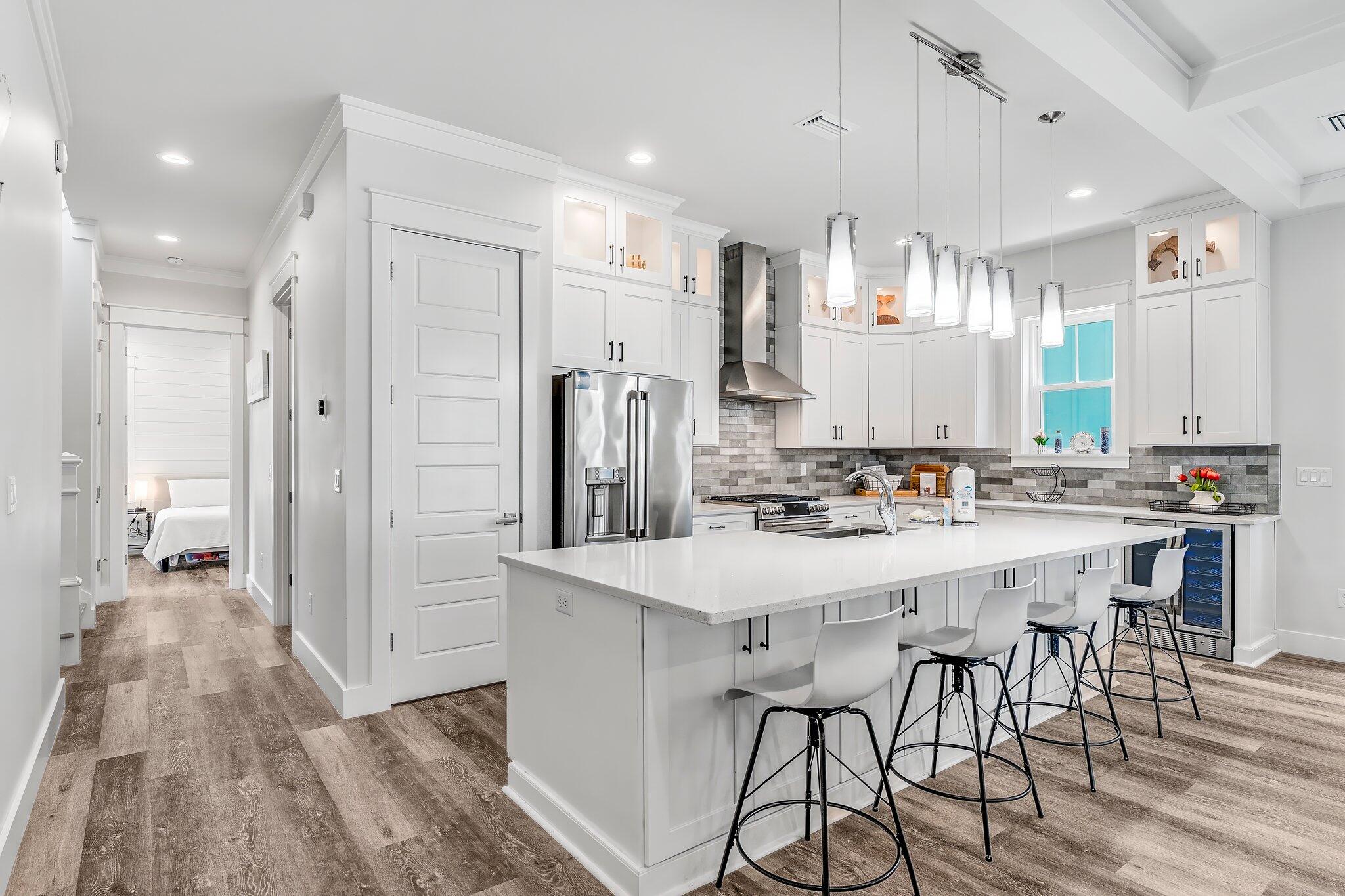 550 Gulfview Circle Santa Rosa Beach, FL 32459 - Photo 8 of 44 a large kitchen with a table and chairs