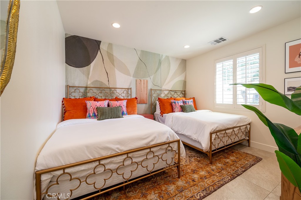 82872 Wordsworth Court Indio, CA 92201 - Photo 15 of 62 a bedroom with bed and a window
