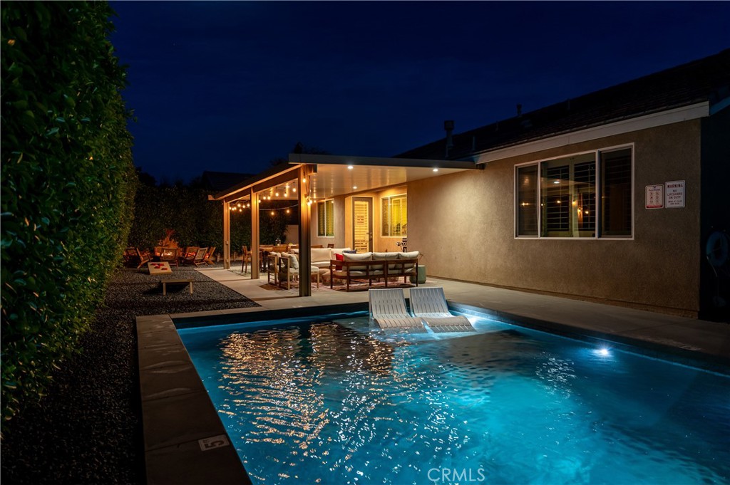 82872 Wordsworth Court Indio, CA 92201 - Photo 2 of 62 a view of swimming pool with outdoor seating