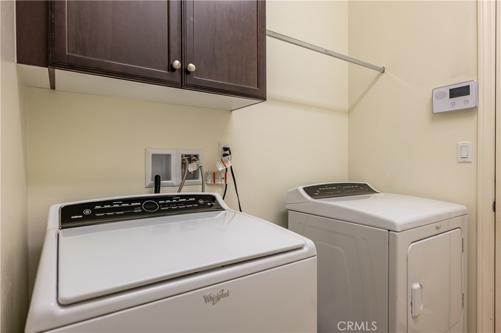 82872 Wordsworth Court Indio, CA 92201 - Photo 31 of 62 a utility room with dryer and washer
