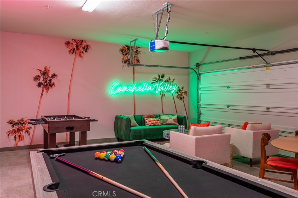 82872 Wordsworth Court Indio, CA 92201 - Photo 34 of 62 a room with furniture and a flat screen tv