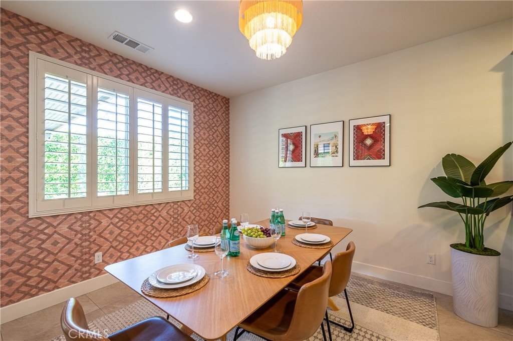 82872 Wordsworth Court Indio, CA 92201 - Photo 9 of 62 a view of a dining room with furniture window and outside view