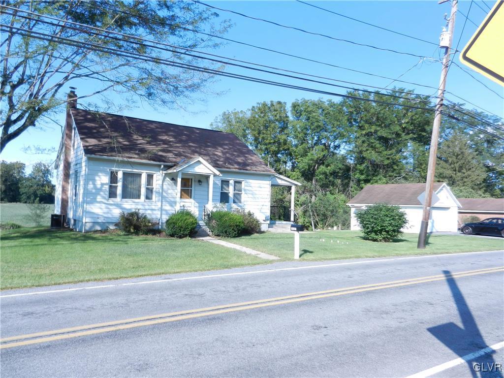 5027 Huckleberry Road Orefield, PA 18069 - Photo 2 of 17 a front view of a house with a yard