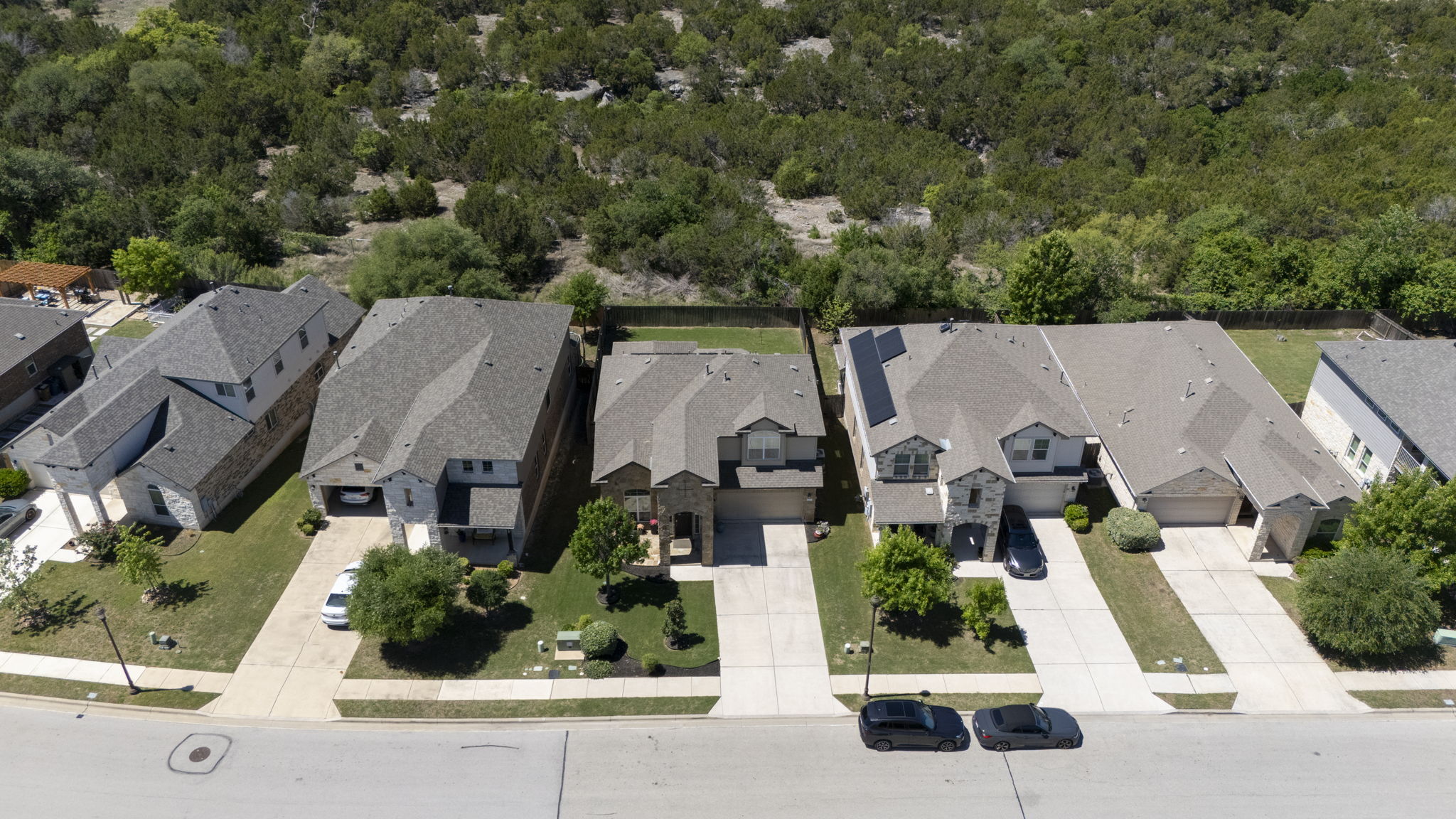 11412 Reading Way Austin, TX 78717 - Photo 31 of 35 an aerial view of a house with a yard and potted plants