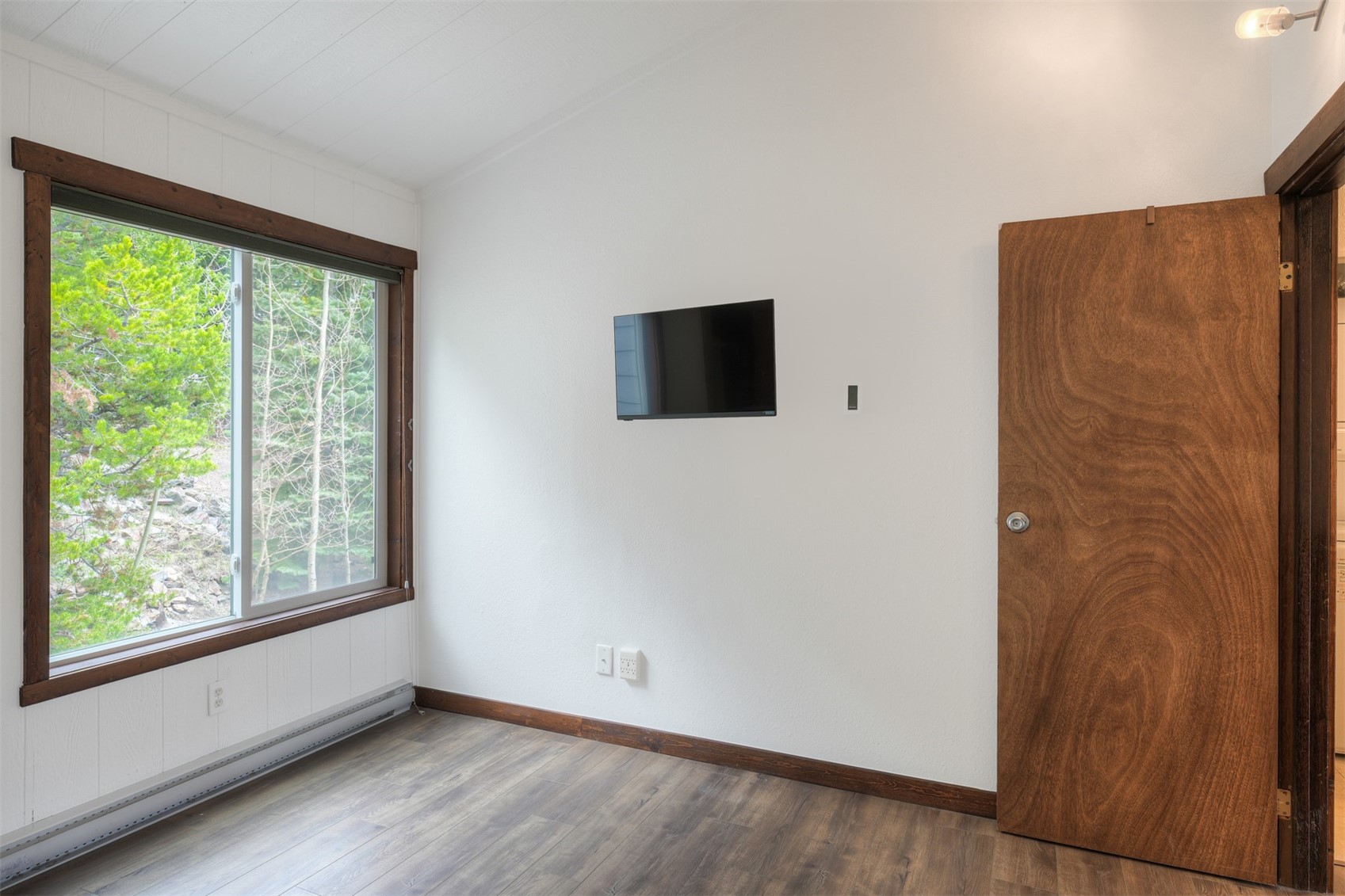 132 Illinois Gulch Road, Unit 3 Breckenridge, CO 80424 - Photo 18 of 32 a view of a livingroom with a flat screen tv