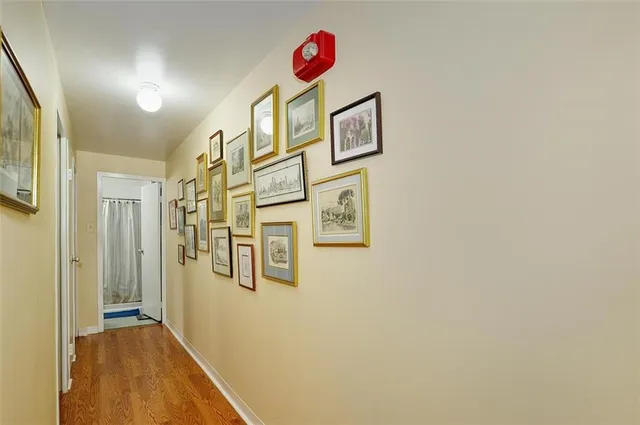 a bathroom with a shower and a sink