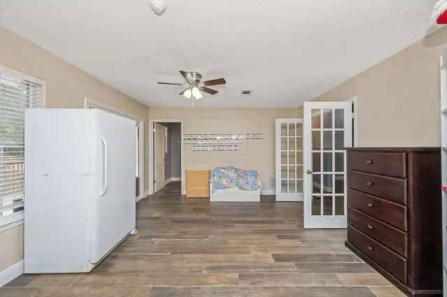 a view of kitchen with furniture and cabinet