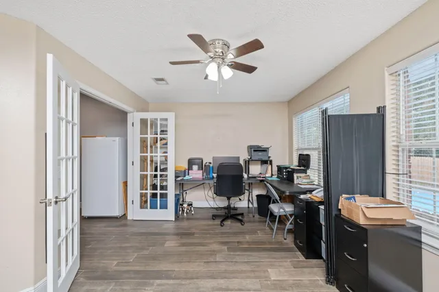 a view of a livingroom with furniture and window
