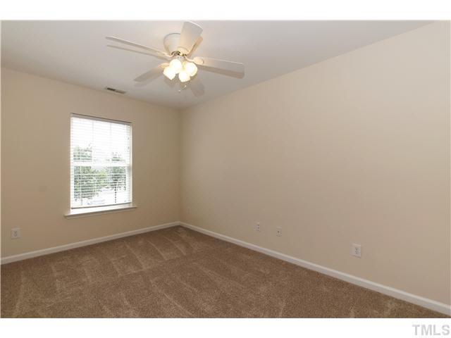 2225 Raven Road, Unit 106 Raleigh, NC 27614 - Photo 14 of 25 a view of an empty room with a window