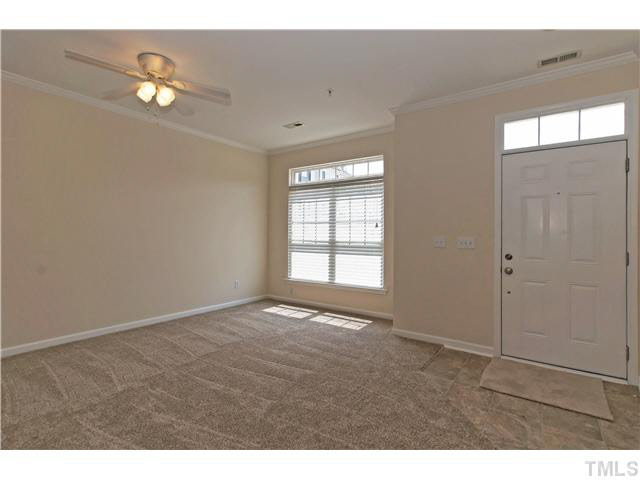 2225 Raven Road, Unit 106 Raleigh, NC 27614 - Photo 5 of 25 a view of an empty room with a window