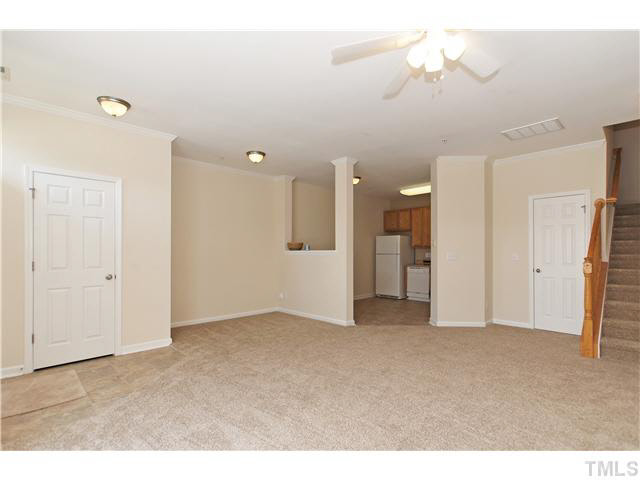 2225 Raven Road, Unit 106 Raleigh, NC 27614 - Photo 6 of 25 a view of empty room with a kitchen
