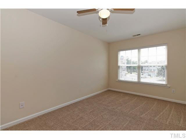 2225 Raven Road, Unit 106 Raleigh, NC 27614 - Photo 10 of 25 a view of an empty room with a window