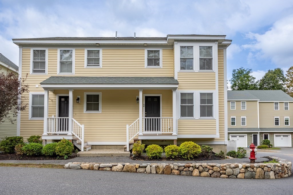 front view of a house with a street