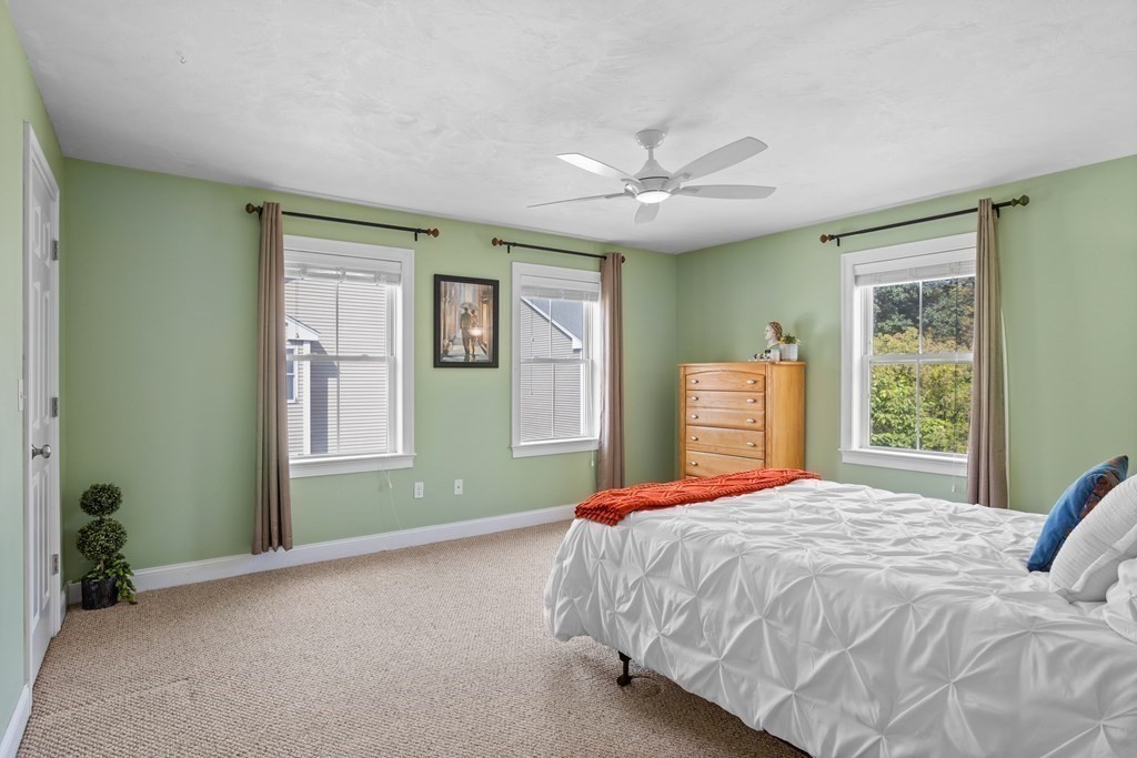 8 High Street, Unit D2 Acton, MA 01720 - Photo 18 of 35 a bedroom with a large bed and a window