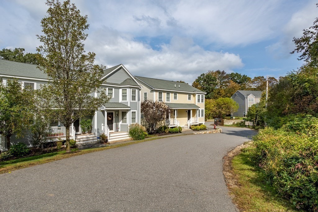 8 High Street, Unit D2 Acton, MA 01720 - Photo 32 of 35 a view of a street with a house in the background