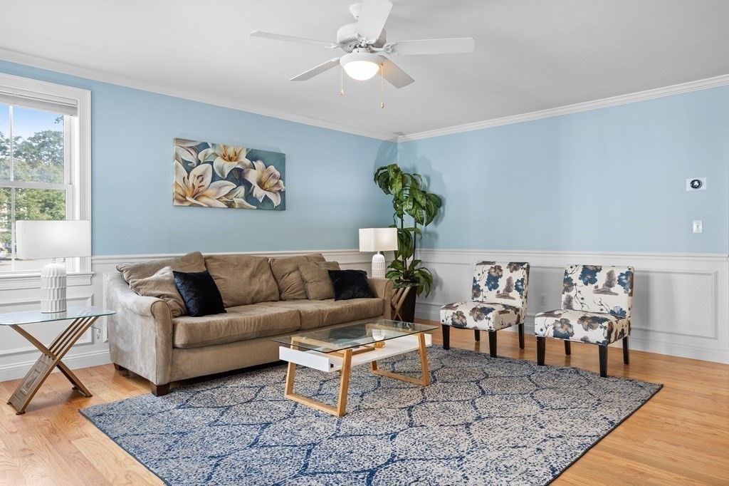 8 High Street, Unit D2 Acton, MA 01720 - Photo 7 of 35 a living room with furniture rug and window