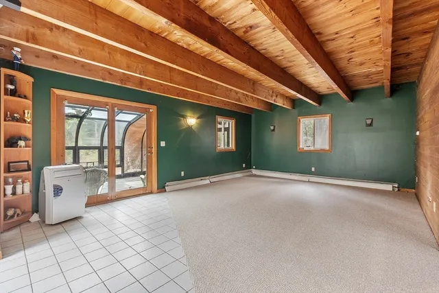 a view of a livingroom with furniture and window