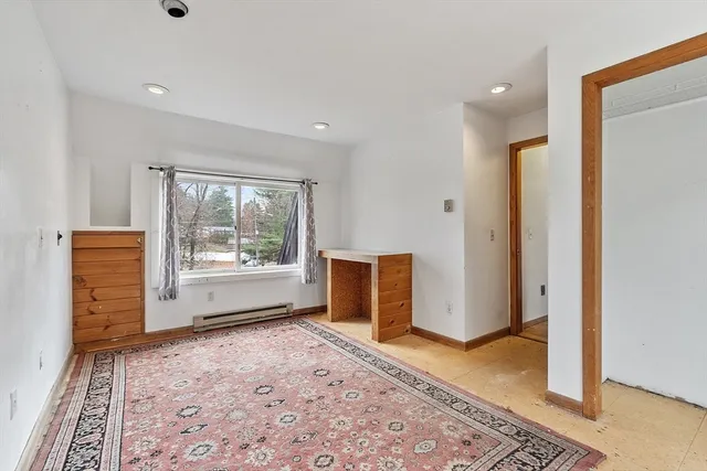 a view of a big room with windows