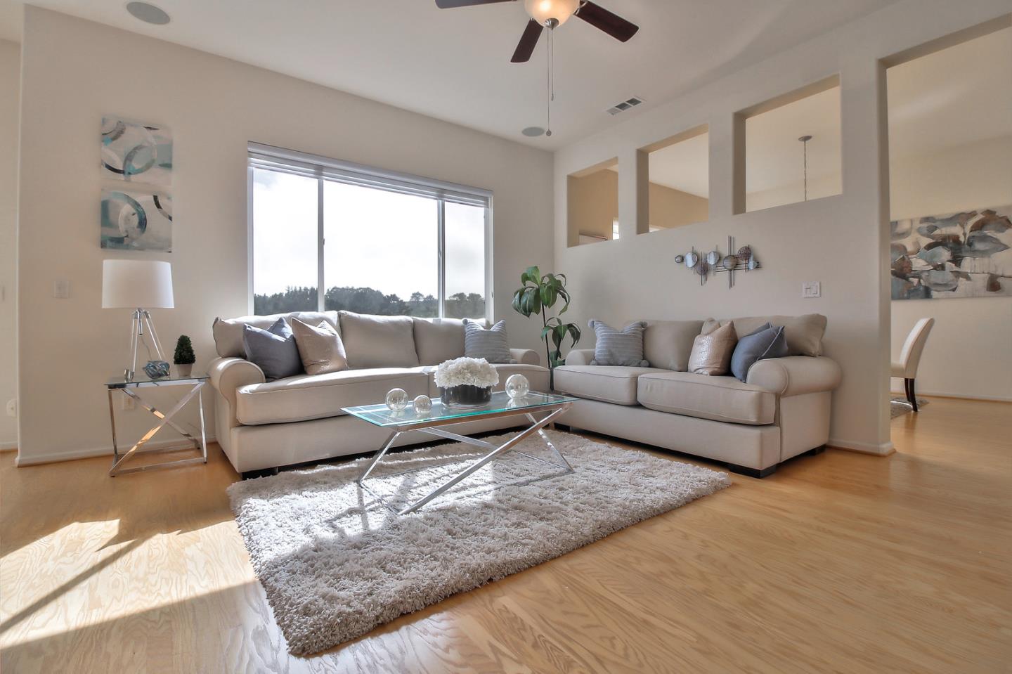897 Skyridge Drive Pacifica, CA 94044 - Photo 11 of 37 a living room with furniture and a large window