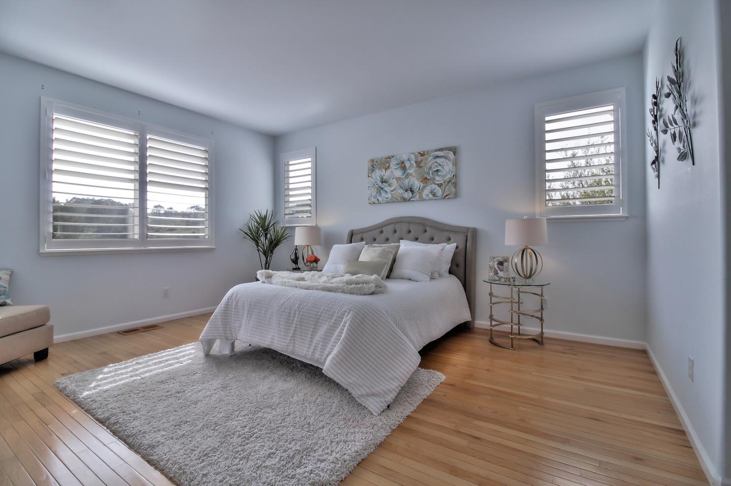 897 Skyridge Drive Pacifica, CA 94044 - Photo 19 of 37 a bedroom with bed and a window