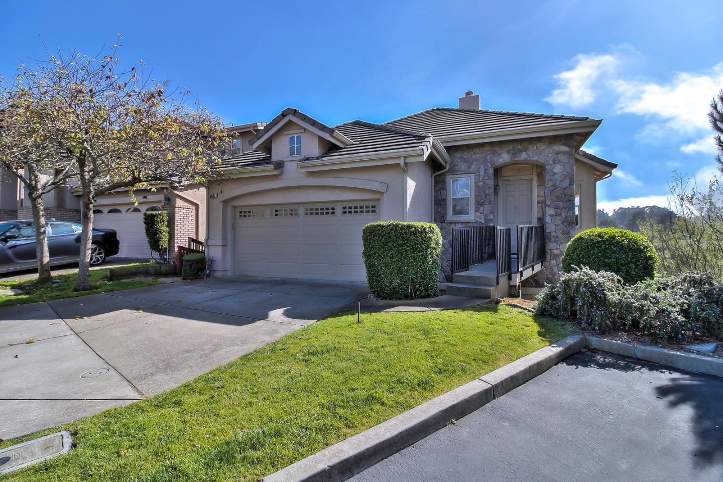 897 Skyridge Drive Pacifica, CA 94044 - Photo 2 of 37 a front view of a house with a yard