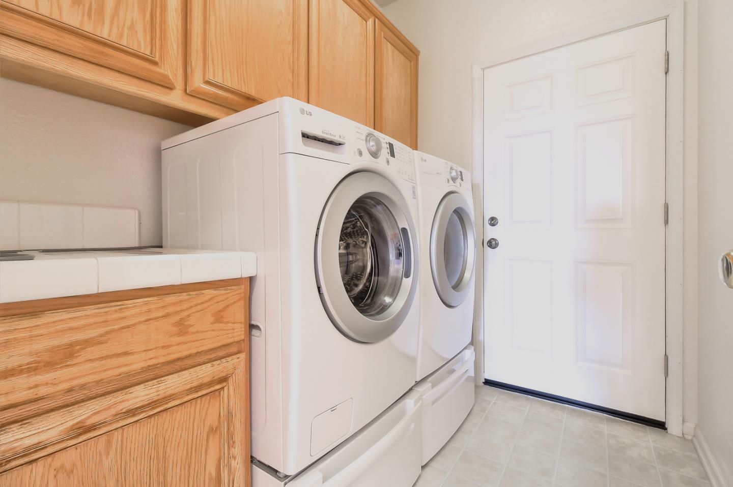 897 Skyridge Drive Pacifica, CA 94044 - Photo 26 of 37 a utility room with dryer and washer