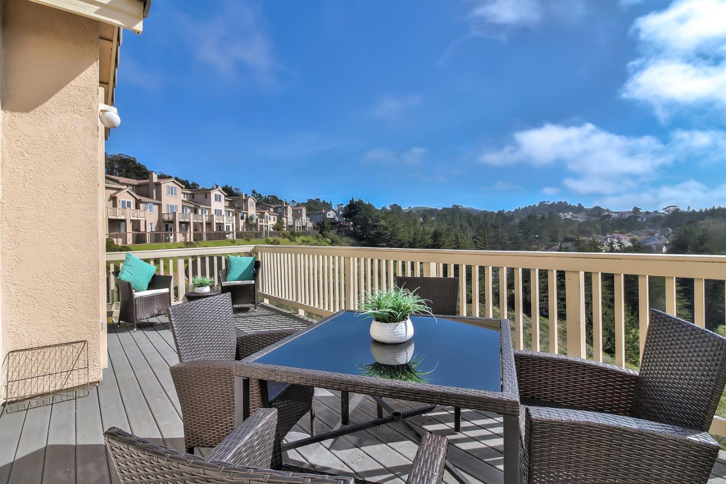 897 Skyridge Drive Pacifica, CA 94044 - Photo 27 of 37 a view of a chairs and table on the roof deck