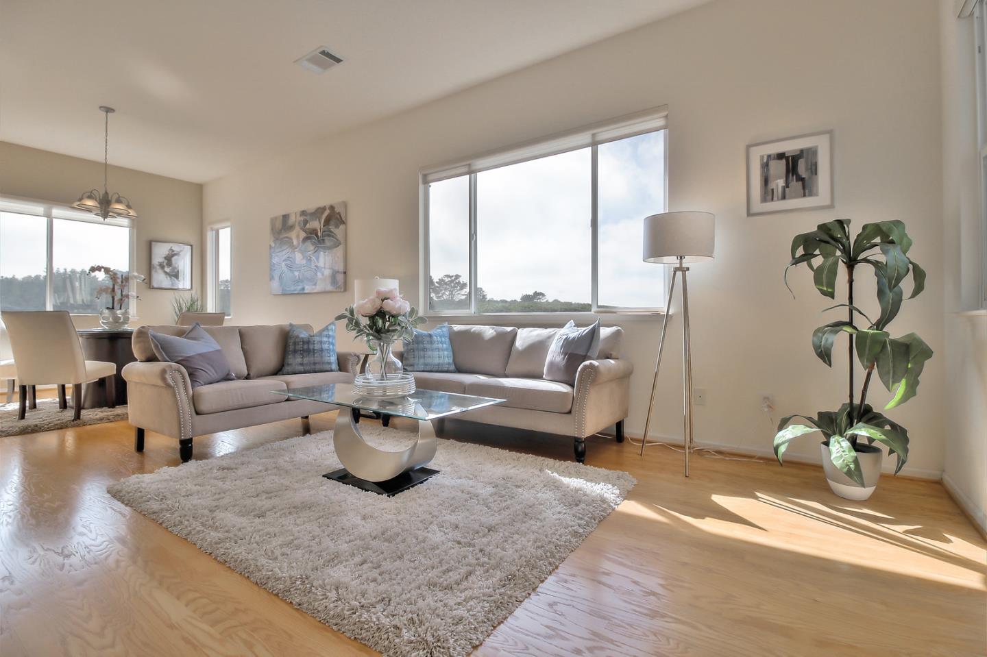 897 Skyridge Drive Pacifica, CA 94044 - Photo 5 of 37 a living room with fireplace furniture and a large window