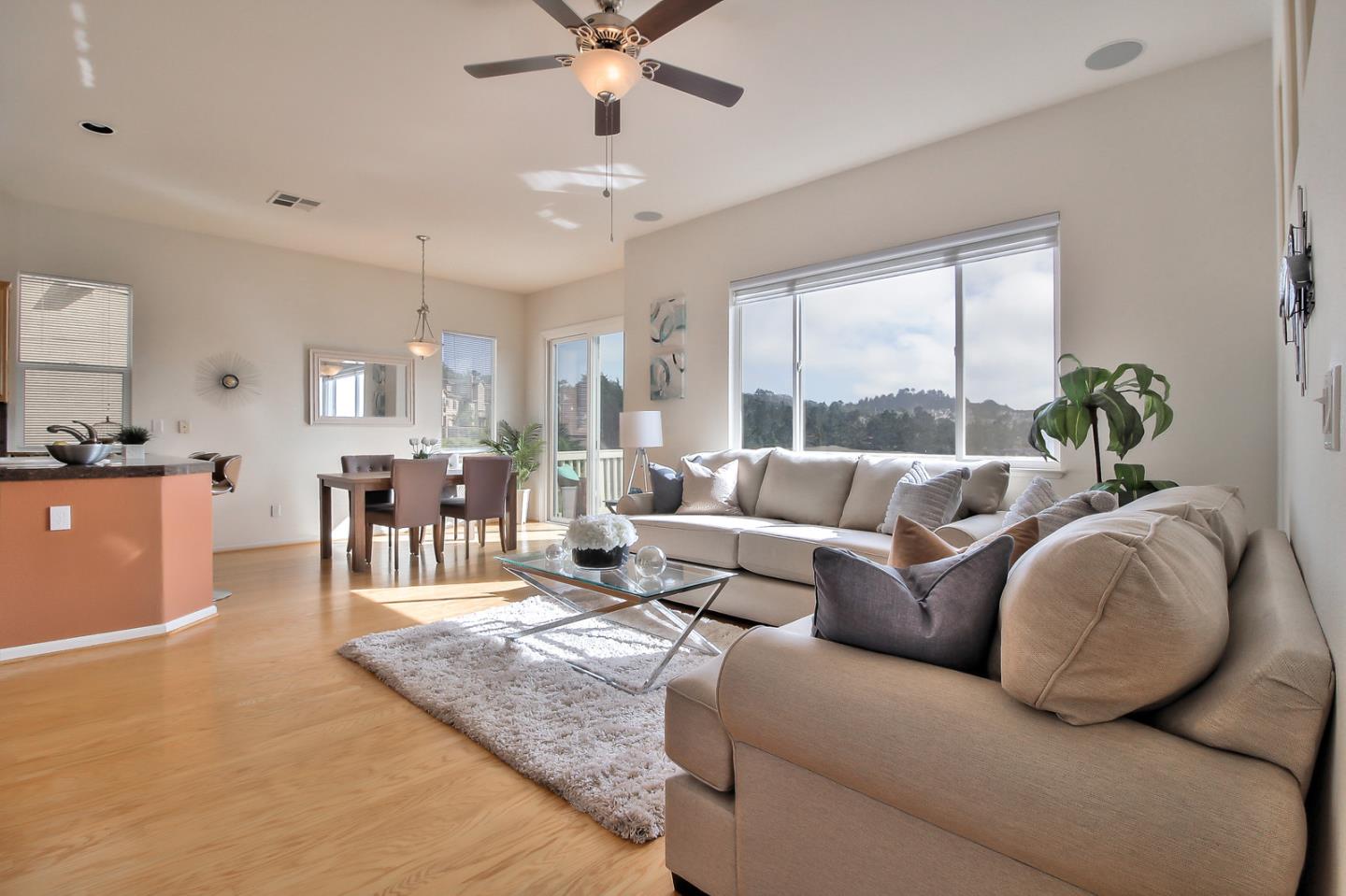 897 Skyridge Drive Pacifica, CA 94044 - Photo 10 of 37 a living room with furniture and a large window