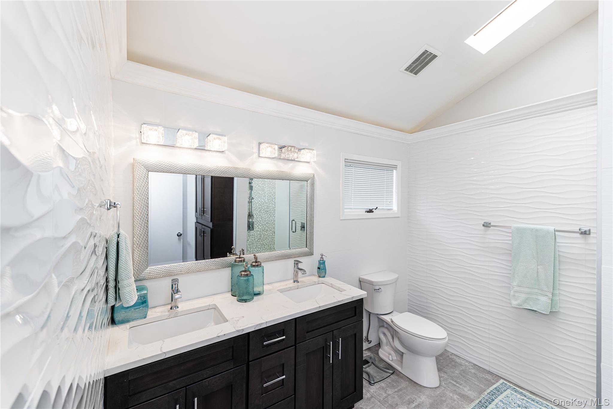 2590 Riverside Drive Wantagh, NY 11793 - Photo 11 of 27 Bathroom featuring a double vanity.