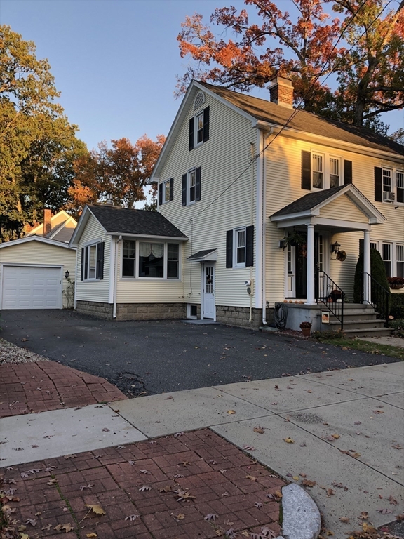 7 Ashbrook Street Springfield, MA 01118 - Photo 2 of 28 a front view of a house with a yard
