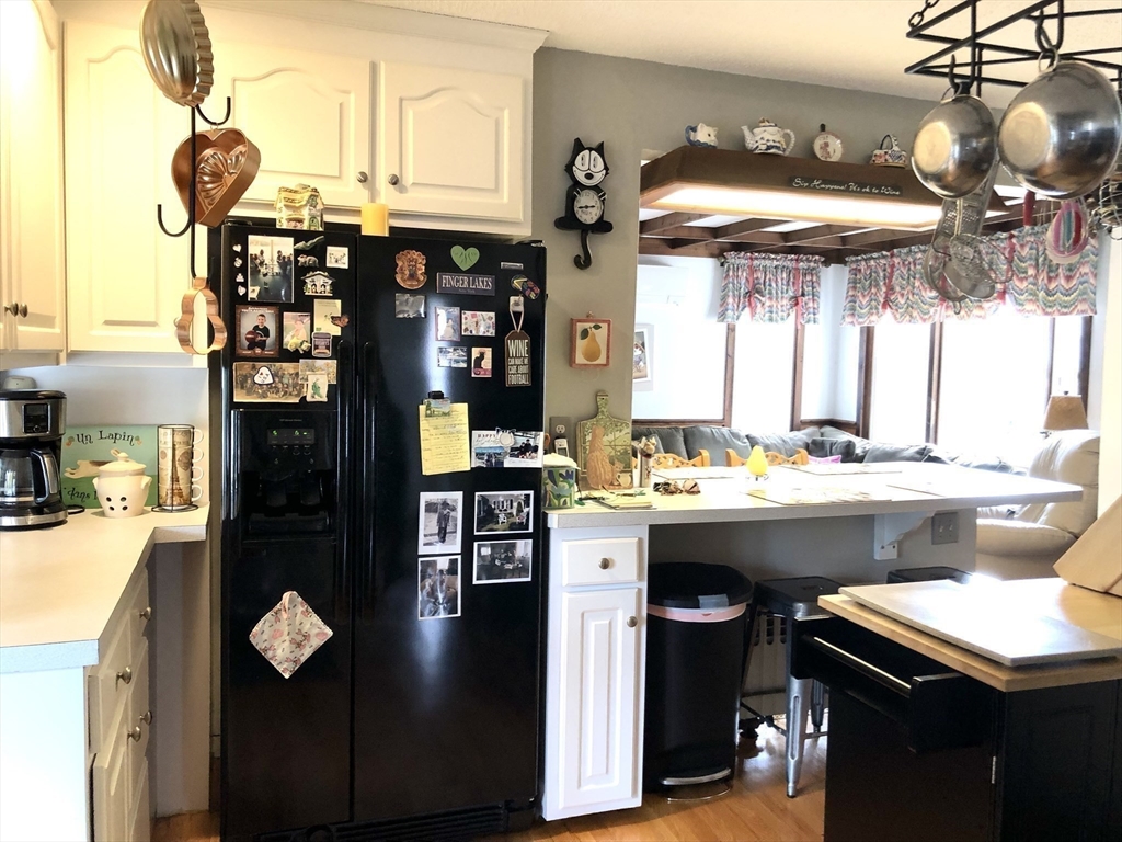 7 Ashbrook Street Springfield, MA 01118 - Photo 5 of 28 a kitchen with a sink appliances and cabinets