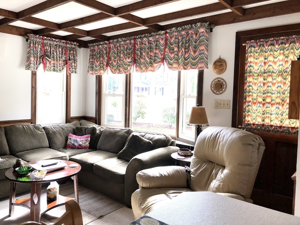 7 Ashbrook Street Springfield, MA 01118 - Photo 10 of 28 a living room with furniture and a large window