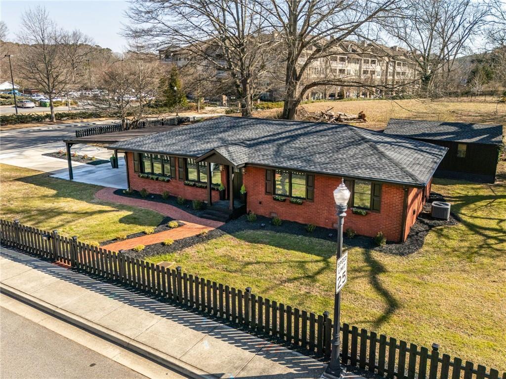 4632 School Street Acworth, GA 30101 - Photo 1 of 1 a view of a backyard with a table and chairs