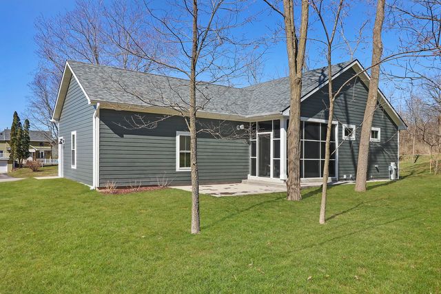 a view of city with ocean