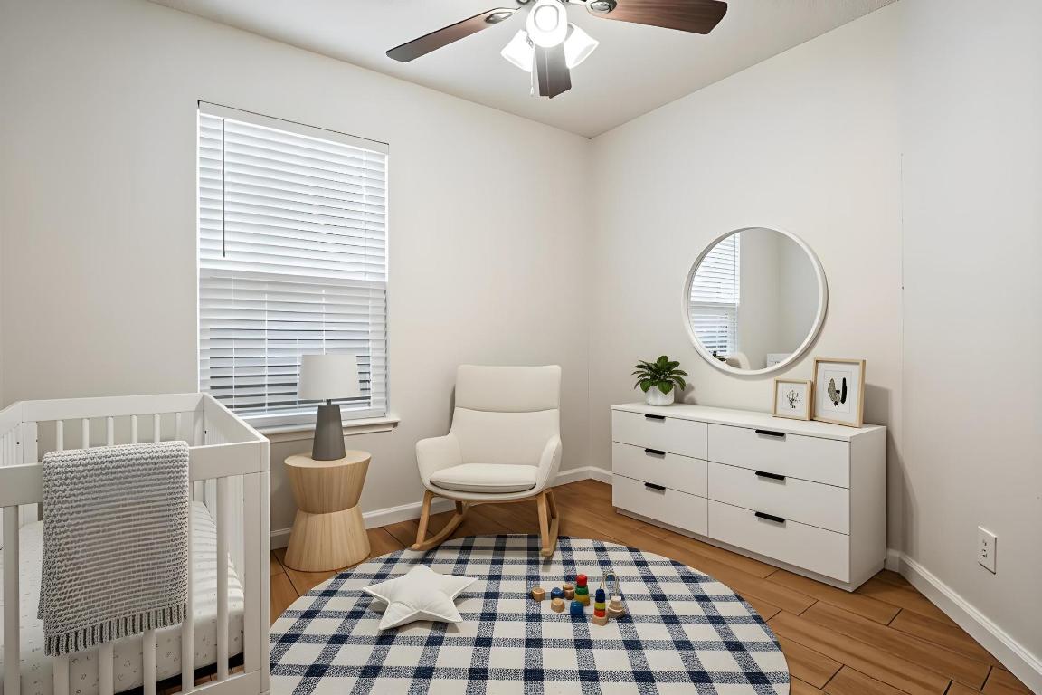 1115 Brookswood Avenue, Unit B Austin, TX 78721 - Photo 22 of 34 a living room with furniture and a window