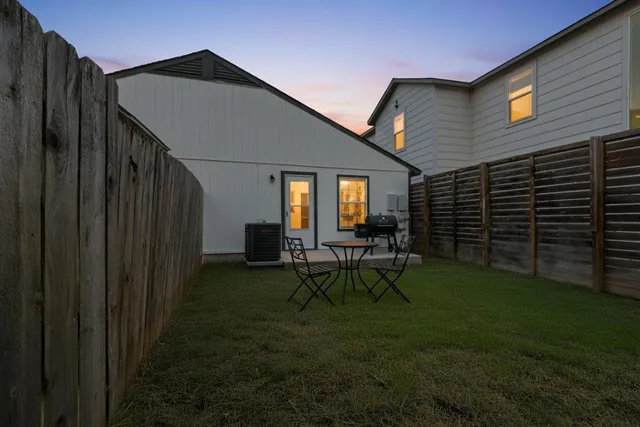 a view of kitchen with cabinets