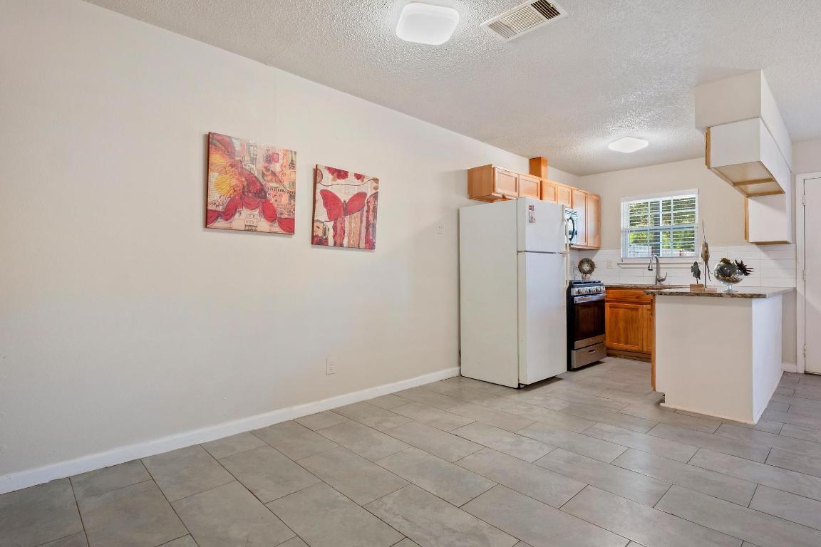 1115 Brookswood Avenue, Unit B Austin, TX 78721 - Photo 34 of 34 a view of kitchen with cabinets
