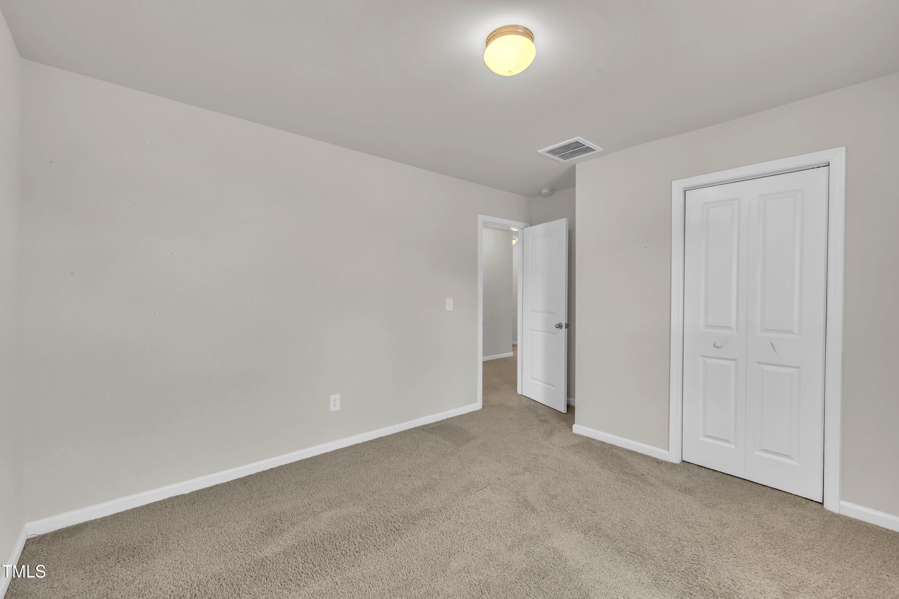 146 Maple Tree Lane Clayton, NC 27527 - Photo 30 of 50 a view of an empty room