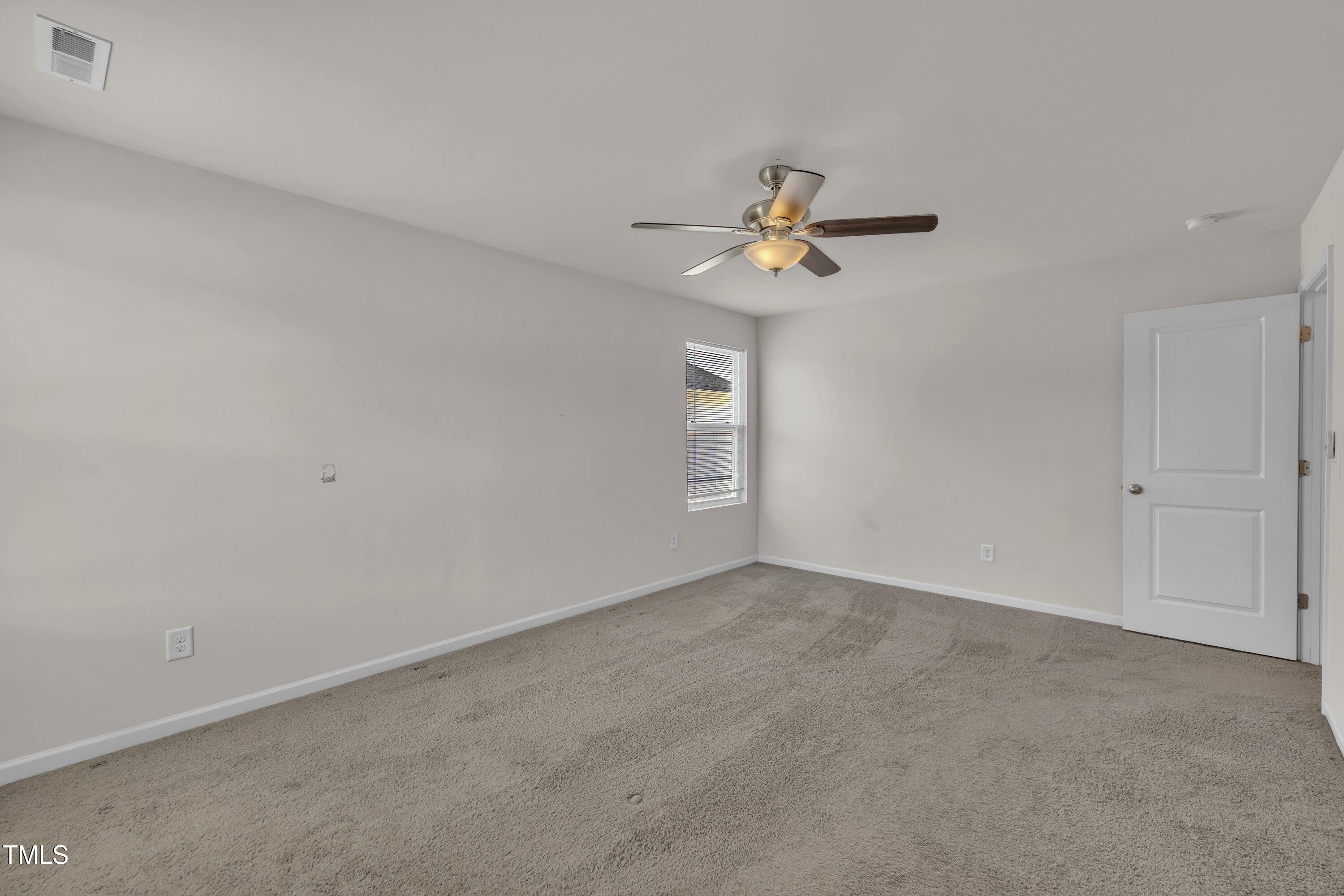146 Maple Tree Lane Clayton, NC 27527 - Photo 37 of 50 a view of a big room with carpet