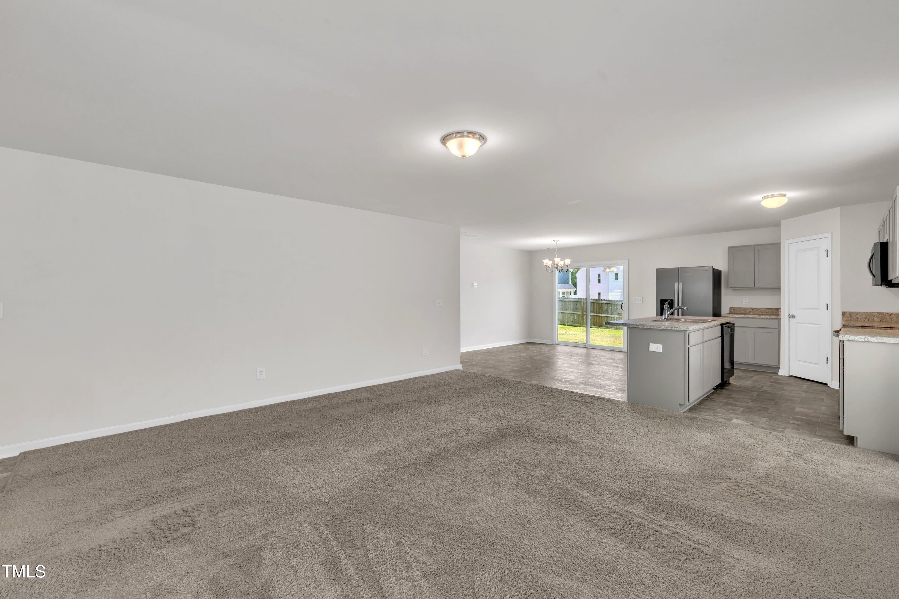 146 Maple Tree Lane Clayton, NC 27527 - Photo 8 of 50 a view of a kitchen with a sink