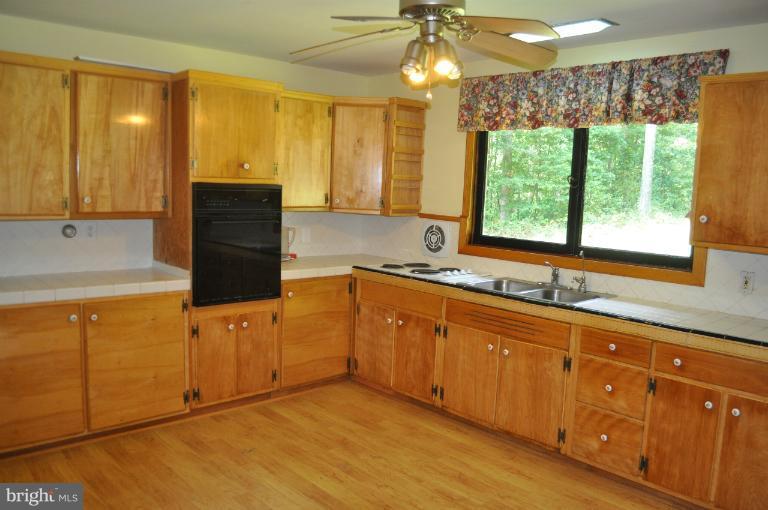1559 Stone Chapel Road New Windsor, MD 21776 - Photo 10 of 12 BRIGHT AND CHEERFUL LOTS OF CABINETS