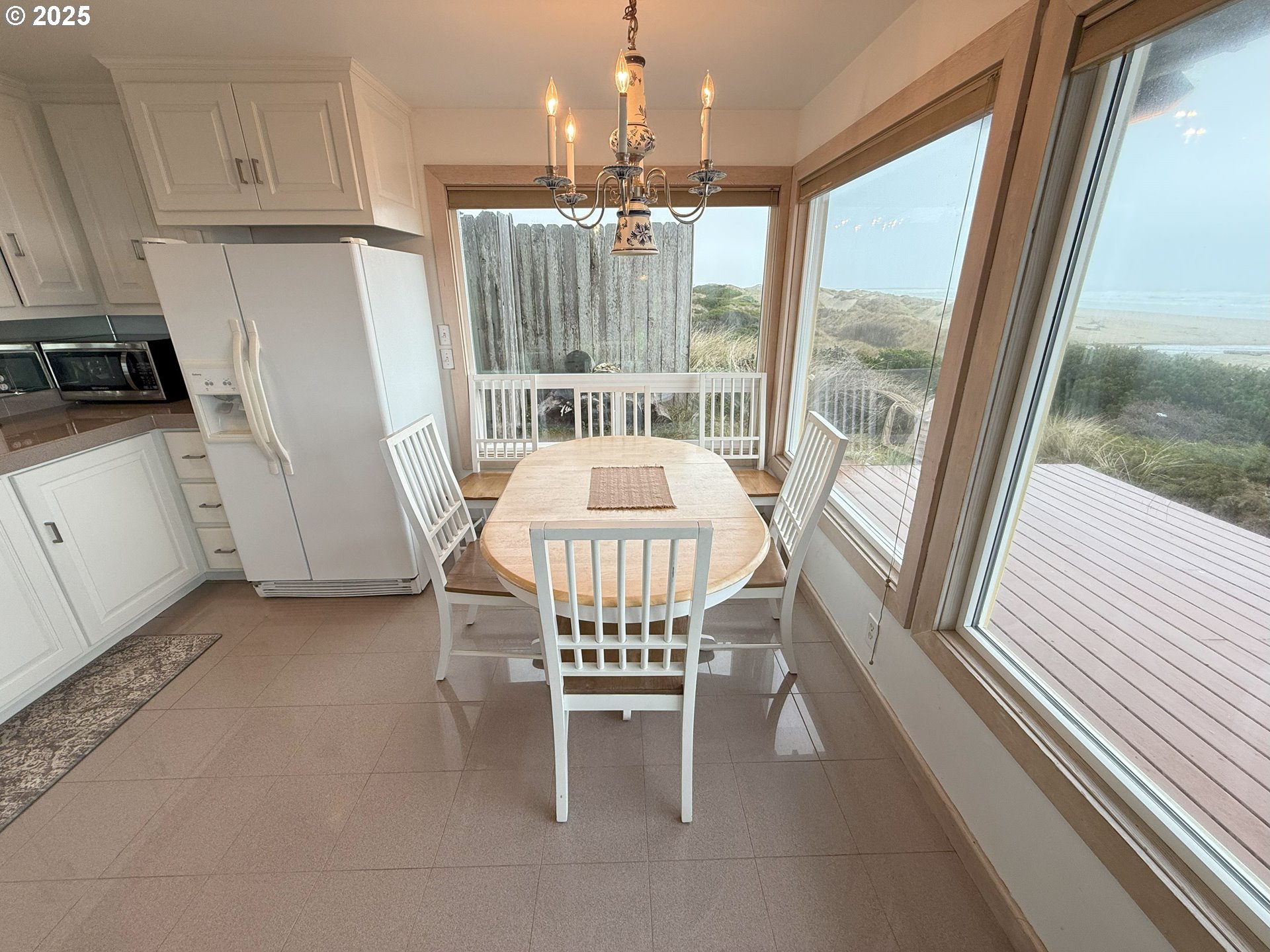4529 Lookout Street Florence, OR 97439 - Photo 12 of 46 a dining room with furniture window and outside view