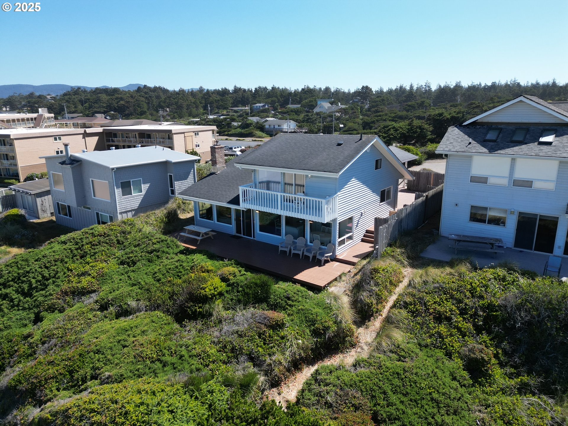 4529 Lookout Street Florence, OR 97439 - Photo 2 of 46 an aerial view of a house with a garden