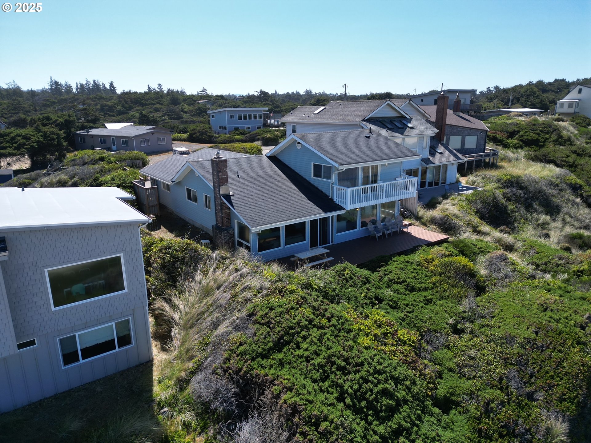 4529 Lookout Street Florence, OR 97439 - Photo 3 of 46 an aerial view of a house with a yard