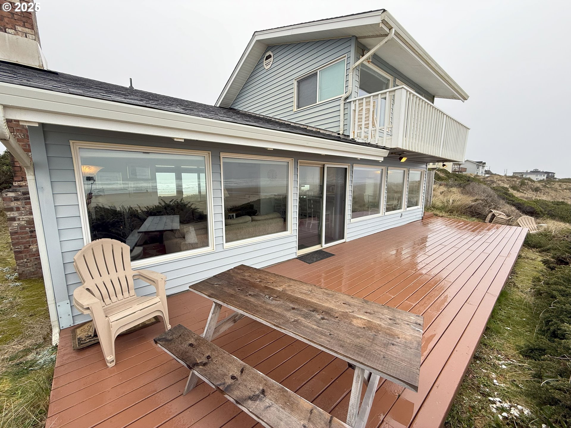 4529 Lookout Street Florence, OR 97439 - Photo 36 of 46 a view of a house with backyard porch and sitting area